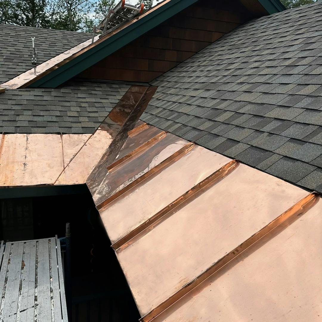 A roof with specialty copper flashing